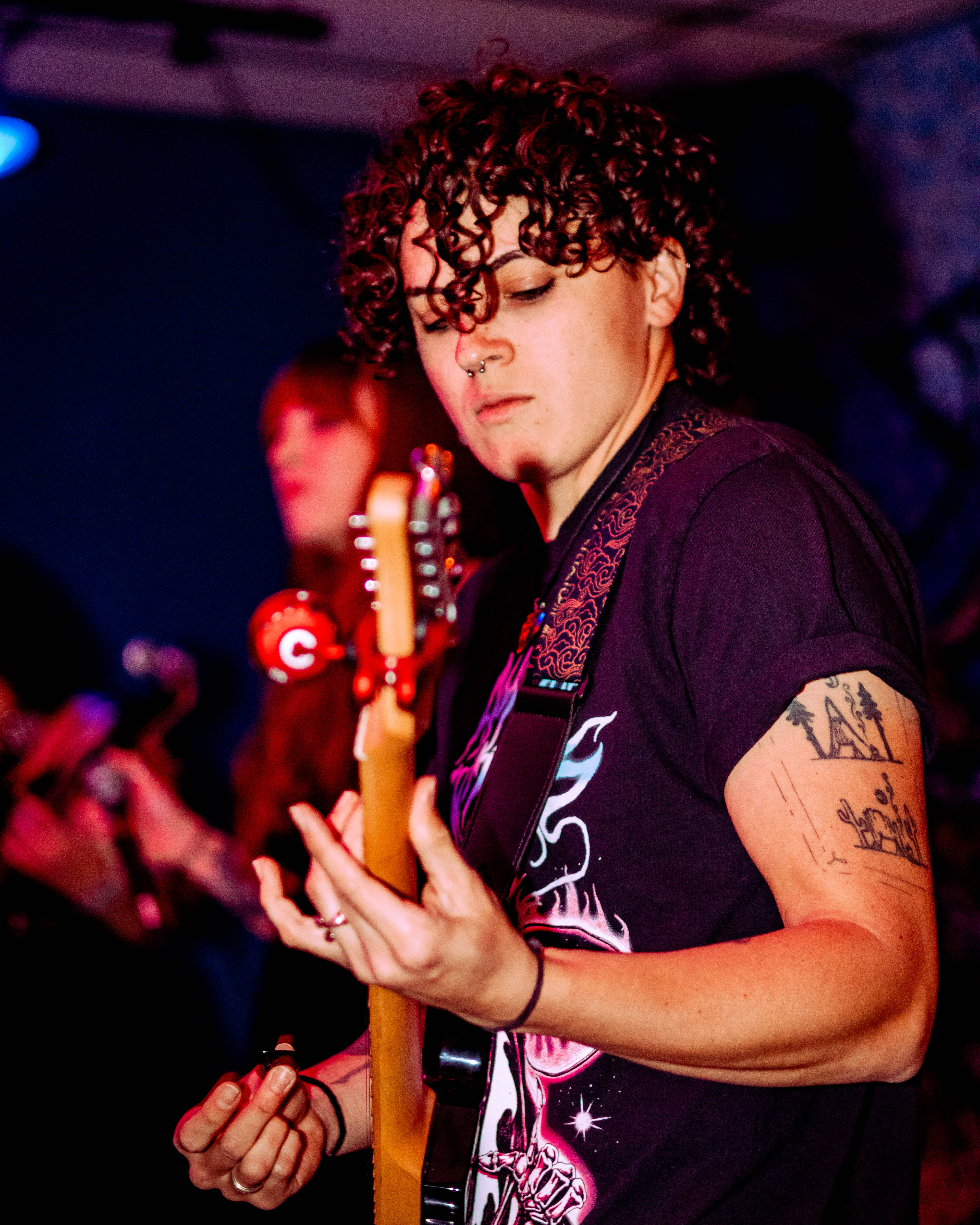 Bite Marks guitarist performing with a motion blur effect
